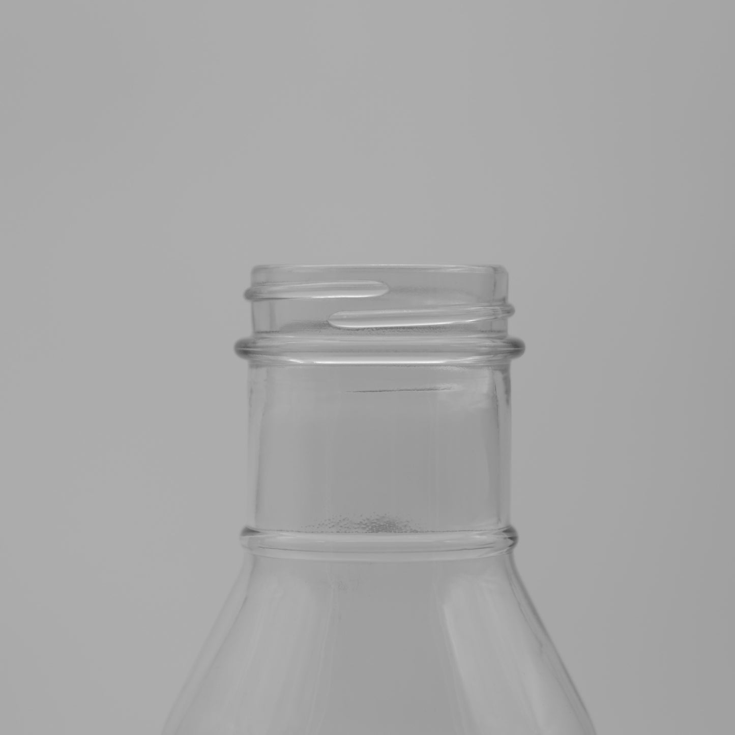 12oz/355ml Clear Glass Ring Neck Bottle 38/400 CT Finish