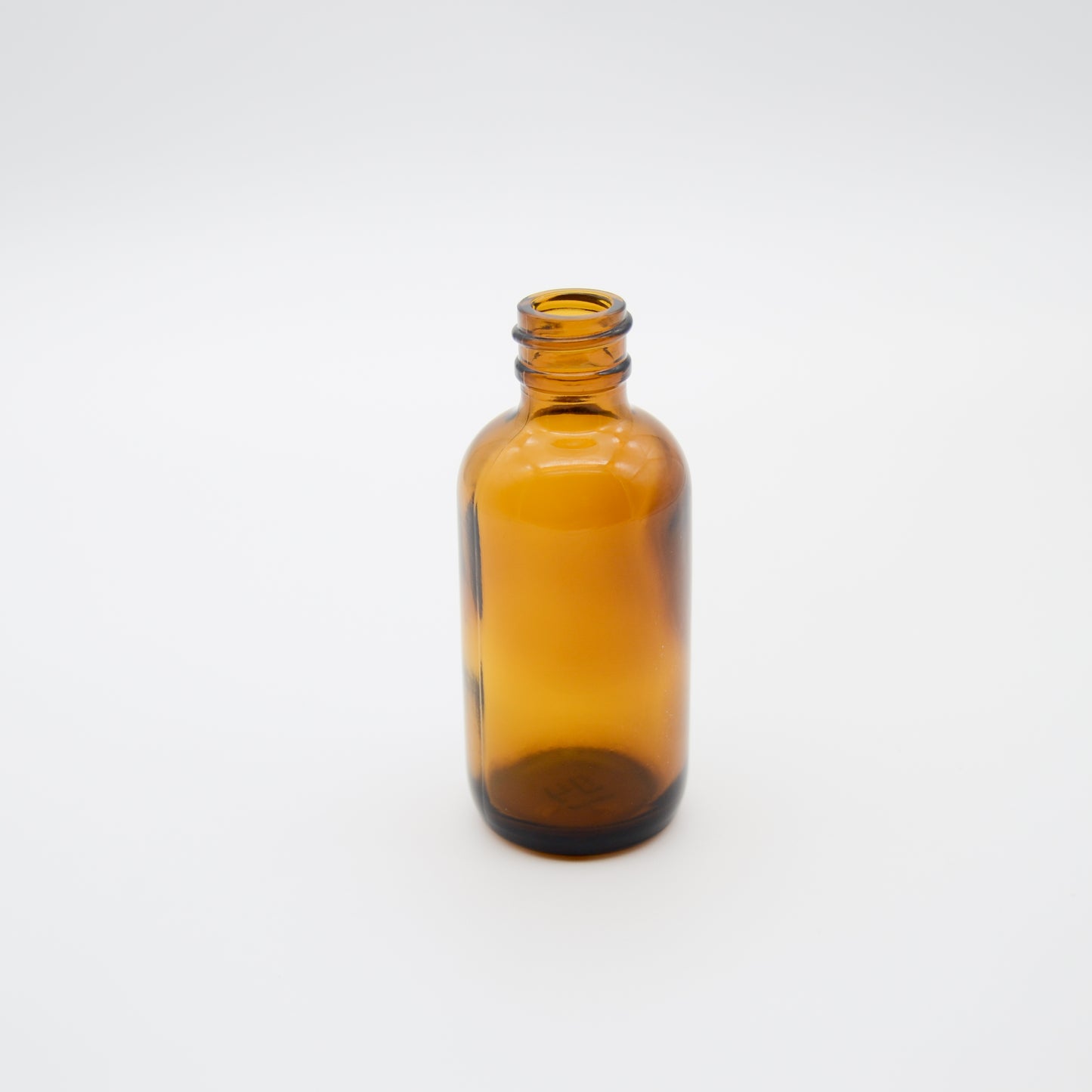 2oz Amber Glass Boston Round Bottle 20/400